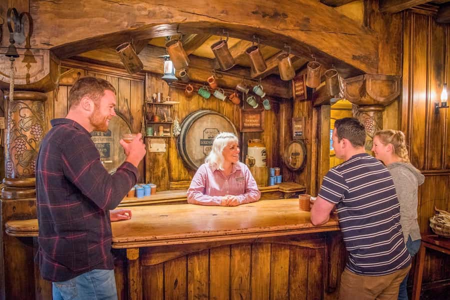 Auckland: Hobbiton Movie Set Day Trip with Festive Lunch - The Party Marquee buffet lunch