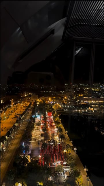 Barcelona: Christmas Lights and Markets Bike Tour - Entering the Gothic Quarter after dark