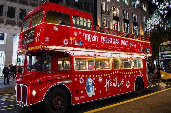 Christmas Lights Tour by Vintage Bus in London - Piccadilly Circus beneath the digital billboards