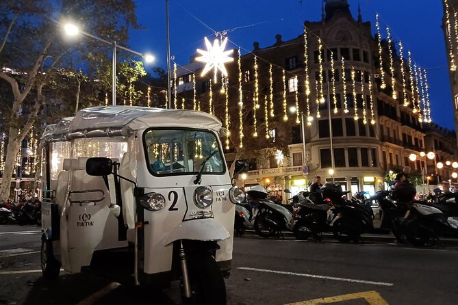 Christmas Lights Tour of Barcelona in Private Eco Tuk Tuk - Robert Palace, Rambla de Catalunya, and Casa Calvet