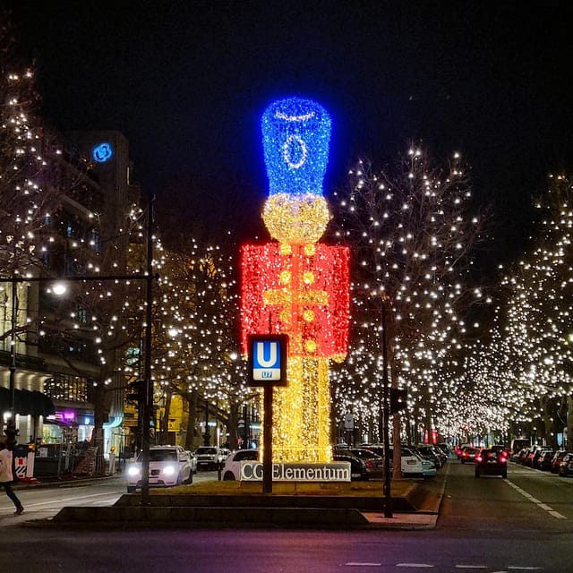 Christmas market lights tour bus through Berlin, free mulled wine (2.5 hours) - Checkpoint Charlie brings a historical pause