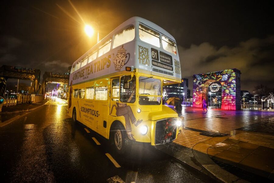 Dublin: Christmas Lights Festive Bus Tour with Afternoon Tea - City Hall, Trinity College, and Dublin after dark