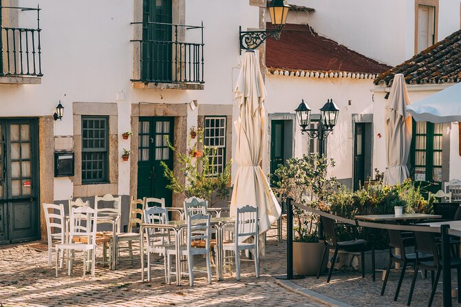 Festive Faro: Historic Christmas Lights & Market Delights - Starting under Faro’s Arco do Repouso