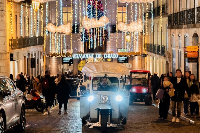 Lisbon Christmas Lights Tuk-Tuk Tour with Local Guide - Rossio Square brings food, lights, and local color