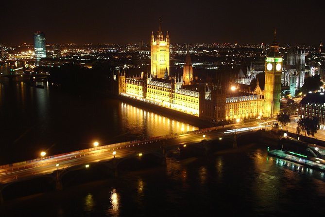 London by Night Bus Tour with Christmas Lights and Live Guide - Piccadilly Circus under the giant screens