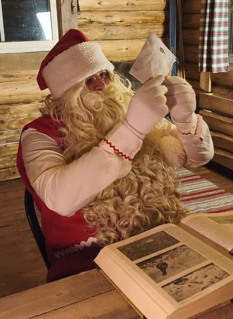 Meet Santa Claus in his magical forest of Sonka Lapland (Rovaniemi) - Following the illuminated path to Santa’s hut