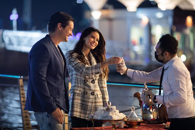 New Years Luxury Dubai Canal Cruise - A glass-enclosed dhow with a modern Dubai route