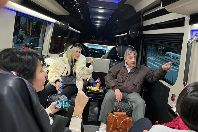 NYC Christmas Lights Tour by Limousine, SUV Or VAN. Dyker Heights - Champagne and snacks require a careful check