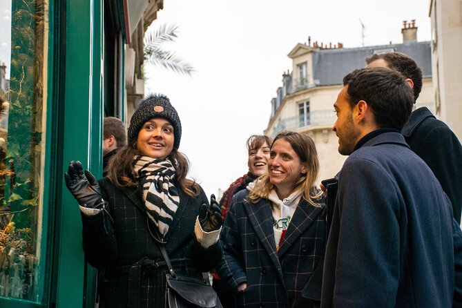 Paris Christmas Lights Small Group Walking Tour with Local Guide - Starting among the food shops on Rue Montorgueil