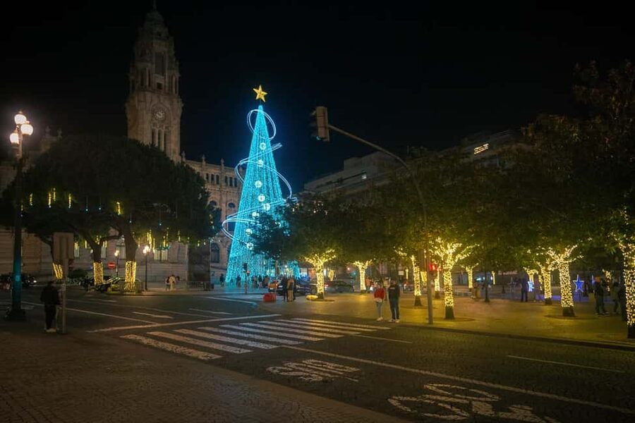 Porto: Christmas Lights Flexible Walking Tour - A quiet garden and the Lello Bookstore façade