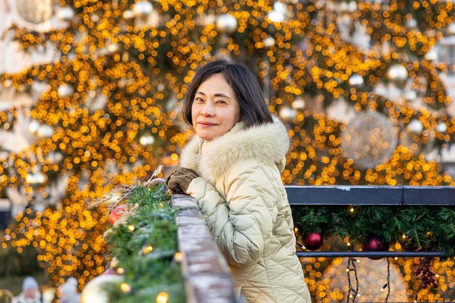 Prague: Christmas/Easter Markets Tour with Photoshoot - A Christmas market walk with a camera in hand