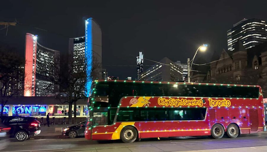 Toronto: Festive Lights Bus Tour - Nathan Phillips Square under seasonal lights