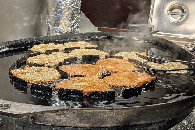Vienna Guided Christmas Market Food and Drink Tour - Altes AKH shows a quieter side of Vienna
